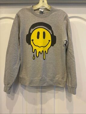 Gray Sweatshirt with Yellow Melting Smiley Graphic.